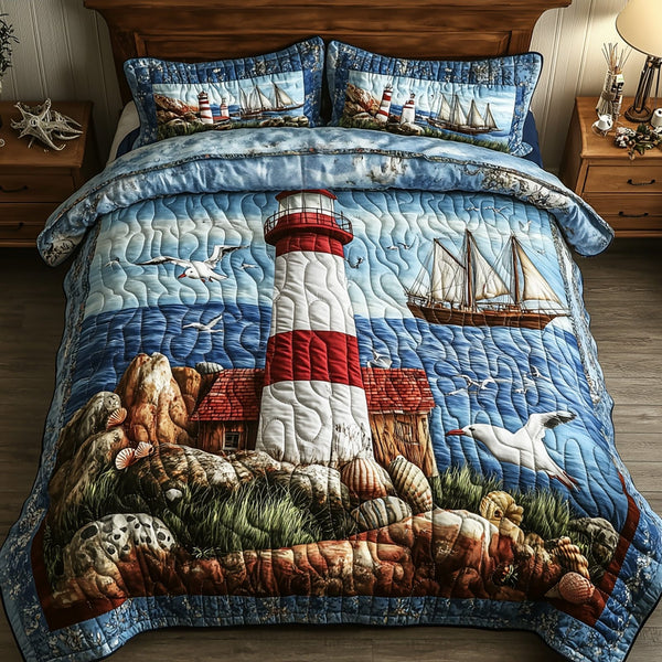 Peaceful Lighthouse quilted 3-piece bedding set on a made bed in a light coastal bedroom