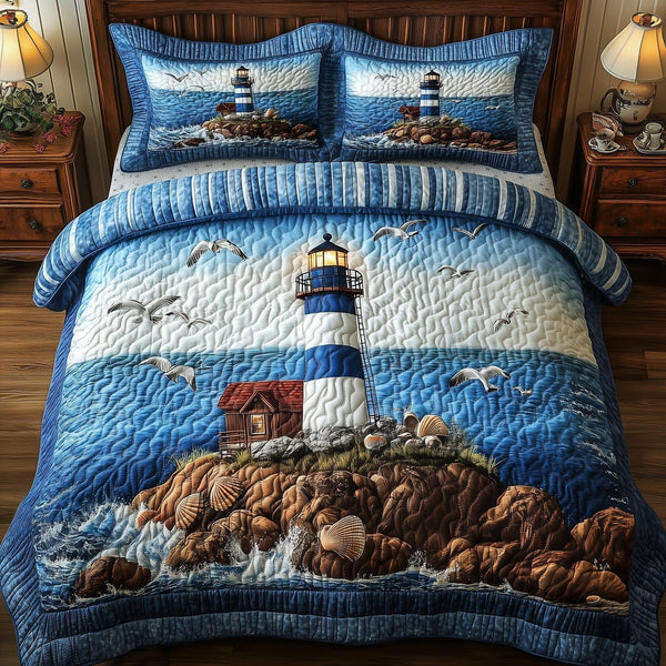 Peaceful Lighthouse quilted 3-piece bedding set on a made bed in a light coastal bedroom