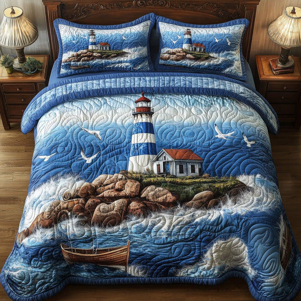 Peaceful Lighthouse quilted 3-piece bedding set on a made bed in a light coastal bedroom