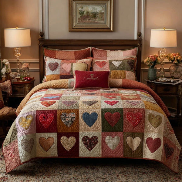 Peaceful Love quilted 3-piece bedding set on a made bed with two matching pillow shams