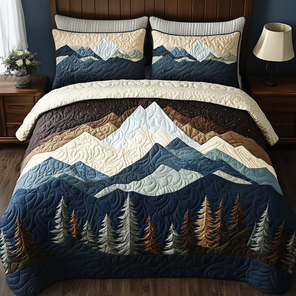 Peaceful Mountain Forest quilted 3-piece bedding set on a made bed with two matching pillow shams