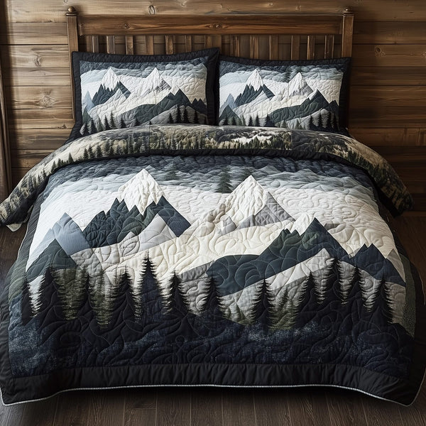 Peaceful Mountain Forest quilted 3-piece bedding set on a made bed with two matching pillow shams
