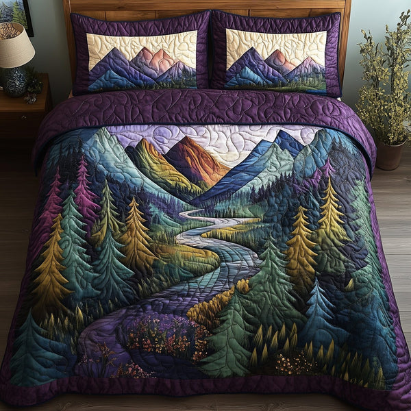 Peaceful Mountain Forest quilted 3-piece bedding set on a made bed with two matching pillow shams