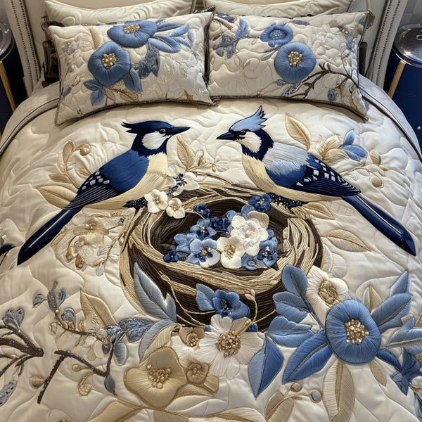 Peaceful Pair quilted 3-piece bedding set on a made bed with two matching pillow shams