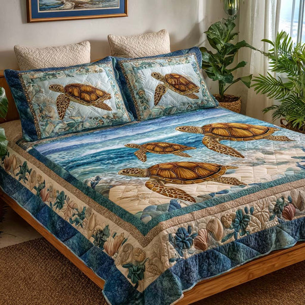 Peaceful Shell quilted 3-piece bedding set on a made bed in a light coastal bedroom