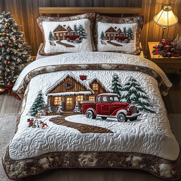 Peaceful Snow Cabin quilted 3-piece bedding set on a made bed with two matching pillow shams