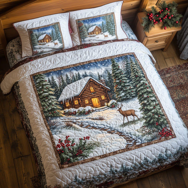 Peaceful Snow Cabin quilted 3-piece bedding set on a made bed with two matching pillow shams
