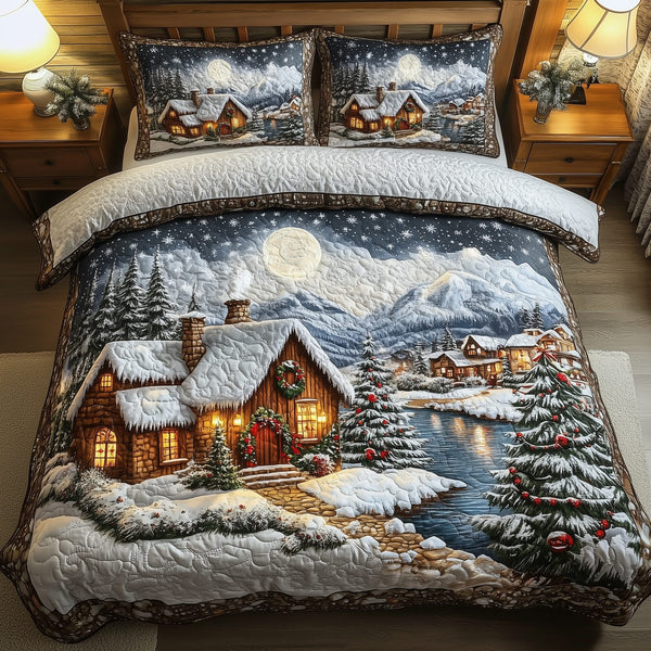 Peaceful Snow Village quilted 3-piece bedding set on a made bed with two matching pillow shams