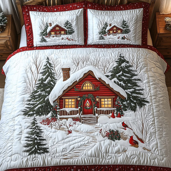Peaceful Winter Cabin quilted 3-piece bedding set on a made bed in a winter-styled bedroom