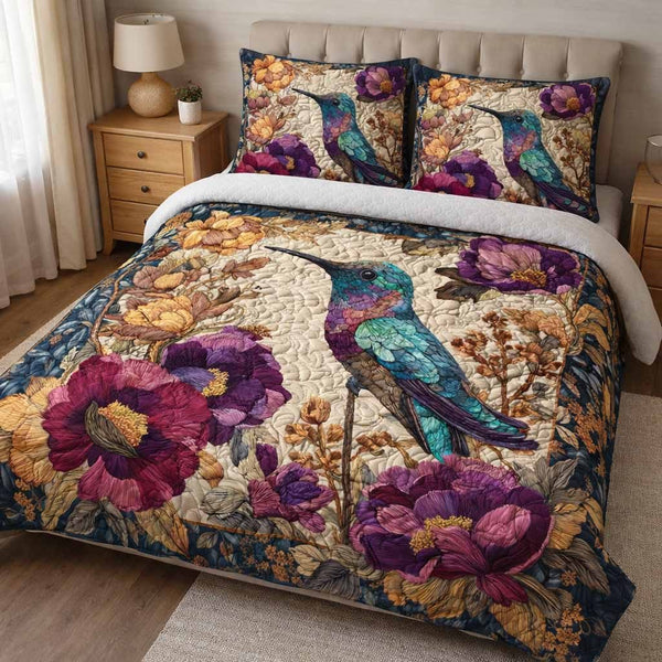Peacock Bloom quilted 3-piece bedding set on a made bed with two matching pillow shams