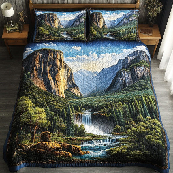 Peak of Yosemite quilted 3-piece bedding set on a made bed with two matching pillow shams
