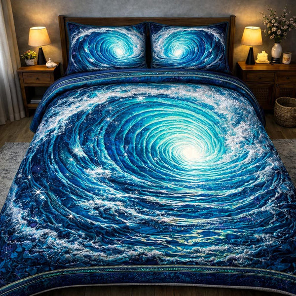Pearl Ocean quilted 3-piece bedding set on a made bed in a light coastal bedroom
