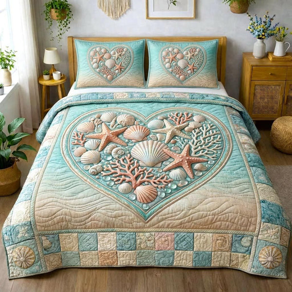 Pearl Ocean quilted 3-piece bedding set on a made bed in a light coastal bedroom