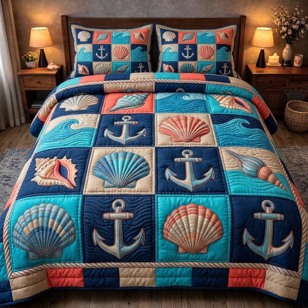 Pearl Ocean quilted 3-piece bedding set on a made bed in a light coastal bedroom