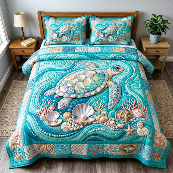 Pearl Reef Turtle quilted 3-piece bedding set on a made bed in a light coastal bedroom