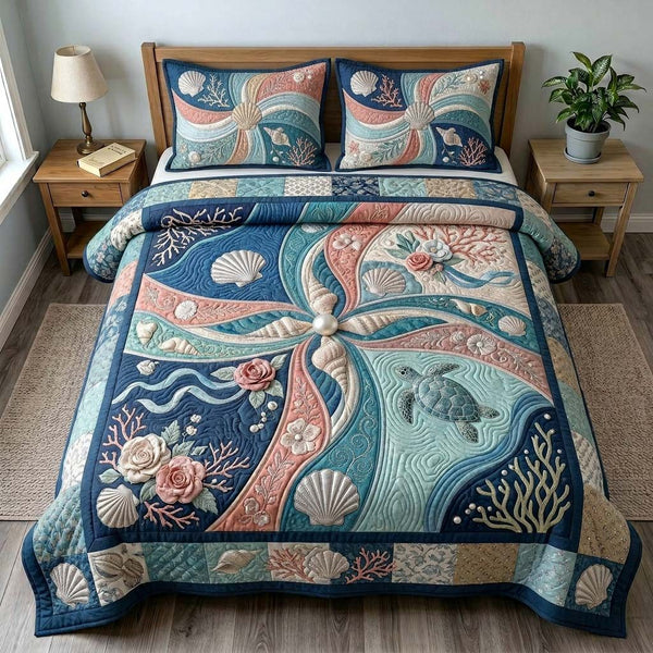 Pearl Tide quilted 3-piece bedding set on a made bed in a light coastal bedroom