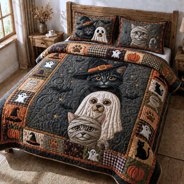 Peeking Halloween Cats quilted 3-piece bedding set on a made bed against a dark styled interior
