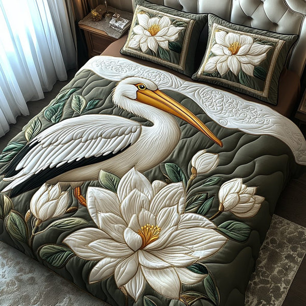 Pelican Reflections quilted 3-piece bedding set on a made bed with two matching pillow shams