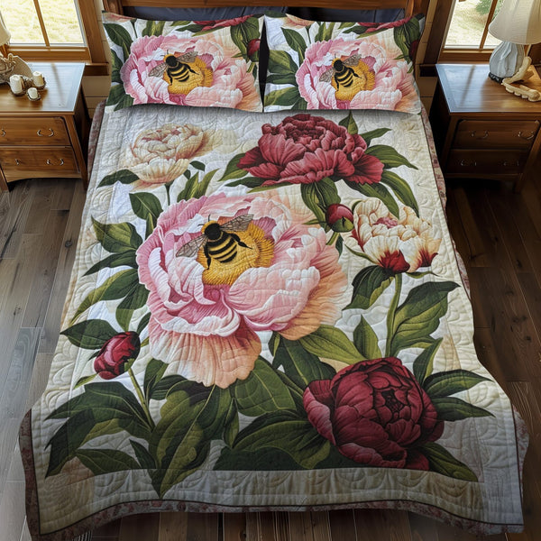 Peony Bee quilted 3-piece bedding set on a made bed with two matching pillow shams