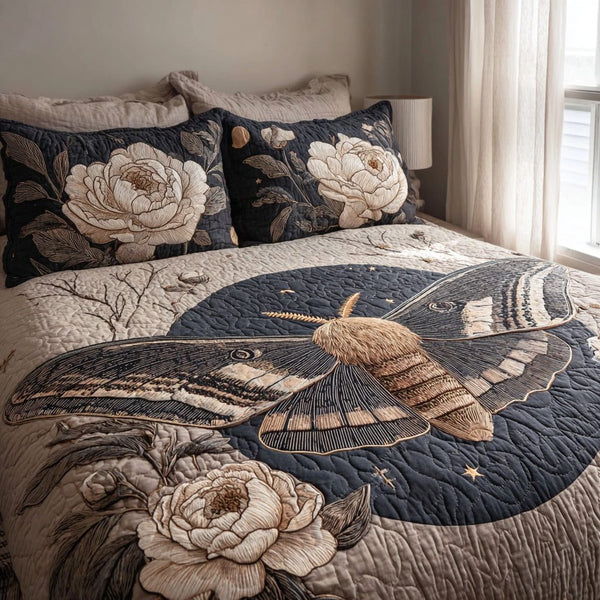Peony Moth quilted 3-piece bedding set on a made bed with two matching pillow shams