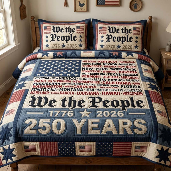 People States quilted 3-piece bedding set on a made bed with two matching pillow shams