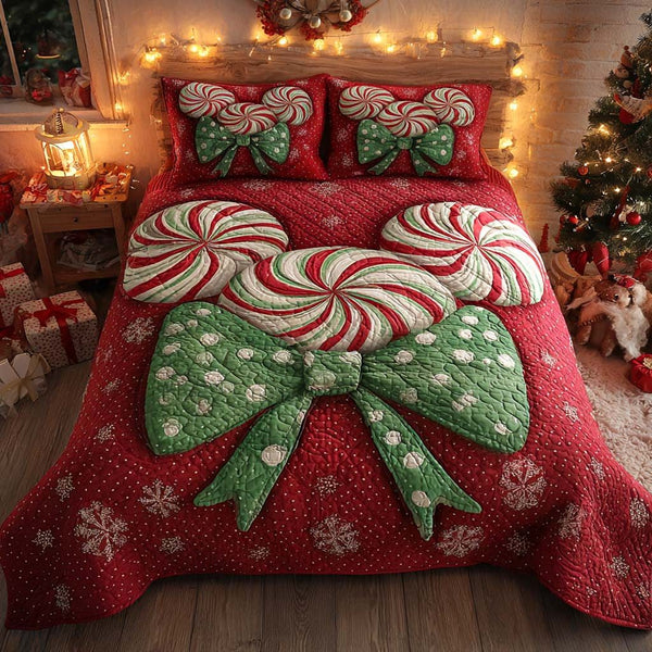 Peppermint Charm quilted 3-piece bedding set on a made bed with two matching pillow shams