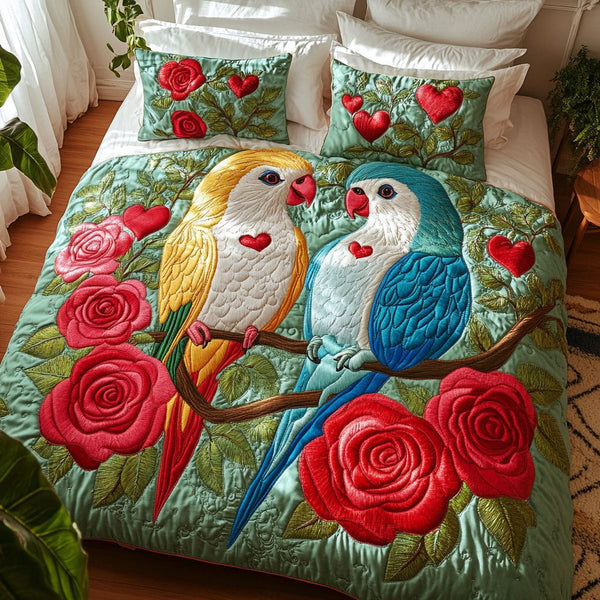 Perched in Love quilted 3-piece bedding set on a made bed with two matching pillow shams
