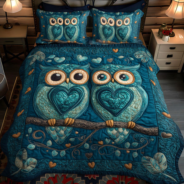 Perched Together quilted 3-piece bedding set on a made bed with two matching pillow shams