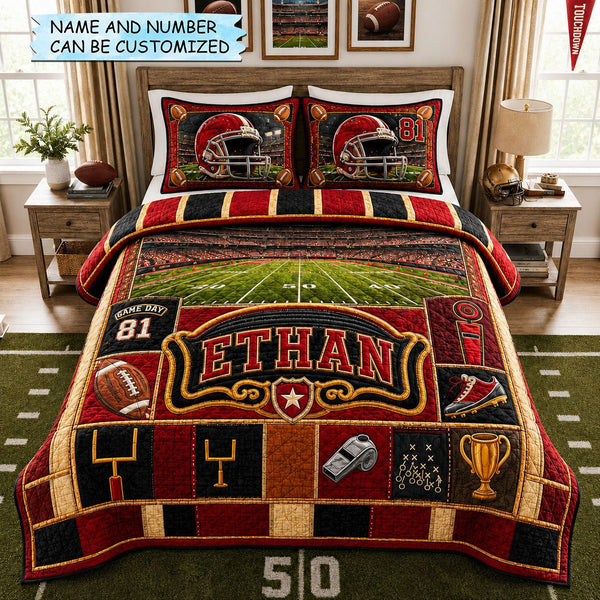 Personalized Football Touchdown Victory Pride 3-Piece Quilted Bedding Set quilted 3-piece bedding set on a made bed with two matching pillow shams