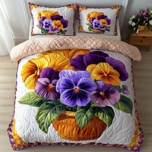 Petal Beauty quilted 3-piece bedding set on a made bed with two matching pillow shams