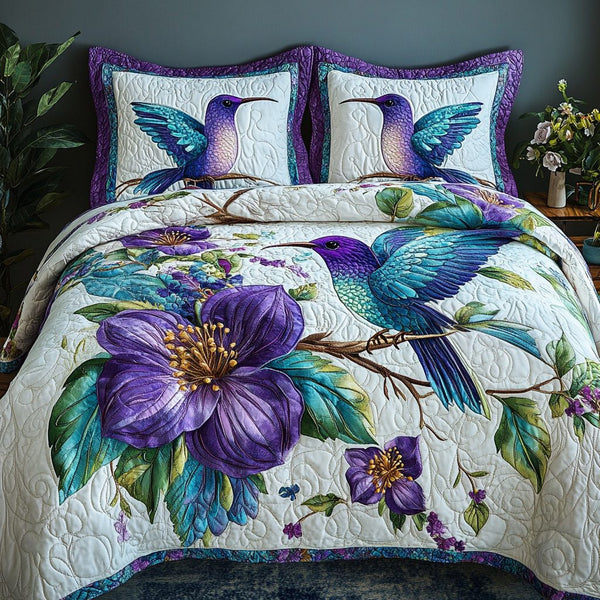 Petal Dance quilted 3-piece bedding set on a made bed with two matching pillow shams