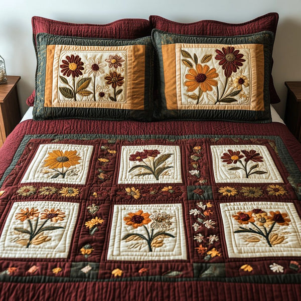 Petal Delight quilted 3-piece bedding set on a made bed with two matching pillow shams