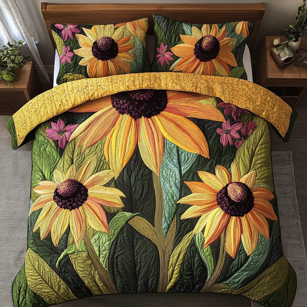 Petal Glow quilted 3-piece bedding set on a made bed with two matching pillow shams