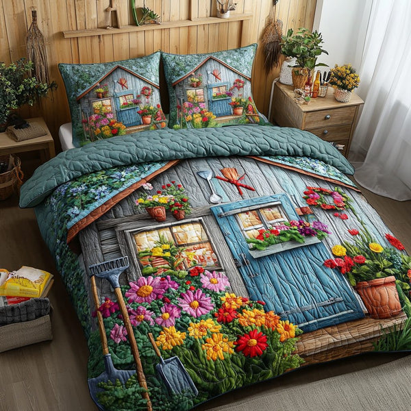 Petal Haven quilted 3-piece bedding set on a made bed with two matching pillow shams