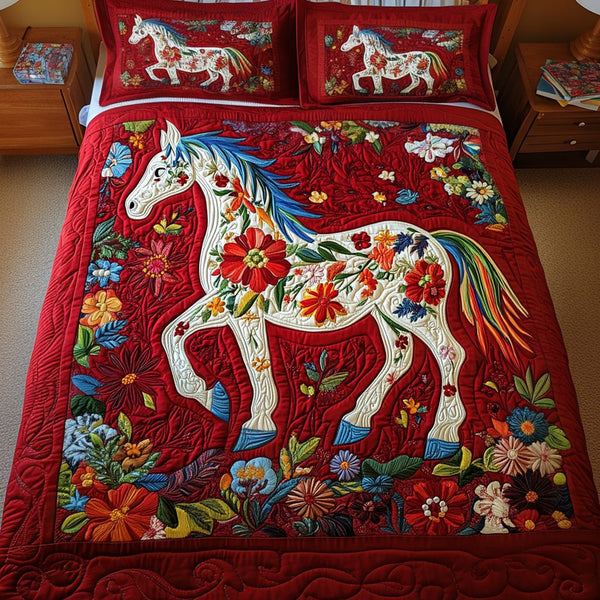 Petal Parade quilted 3-piece bedding set on a made bed with two matching pillow shams