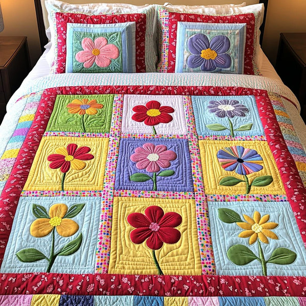 Petal Parade quilted 3-piece bedding set on a made bed with two matching pillow shams