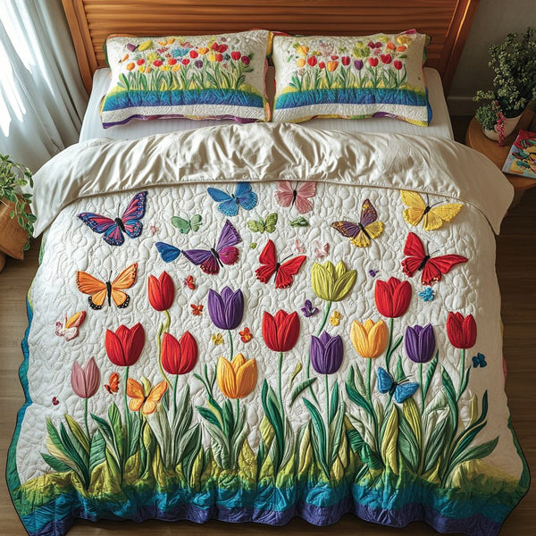 Petal Parade quilted 3-piece bedding set on a made bed with two matching pillow shams
