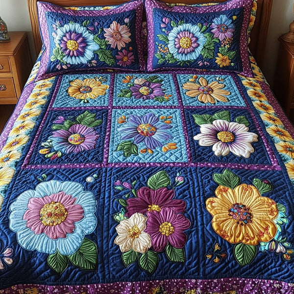 Petal Paradise quilted 3-piece bedding set on a made bed with two matching pillow shams