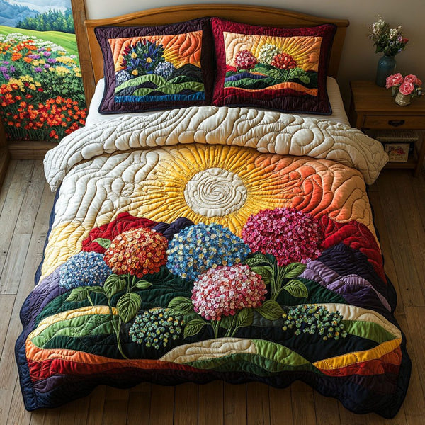 Petal Paradise quilted 3-piece bedding set on a made bed with two matching pillow shams