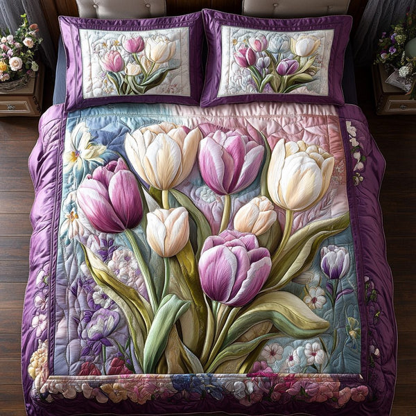 Petal Paradise quilted 3-piece bedding set on a made bed with two matching pillow shams