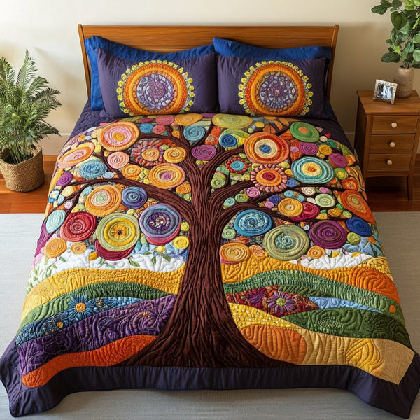 Petal Pathway quilted 3-piece bedding set on a made bed with two matching pillow shams