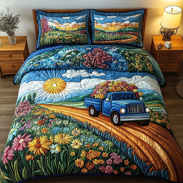 Petal Slope quilted 3-piece bedding set on a made bed with two matching pillow shams