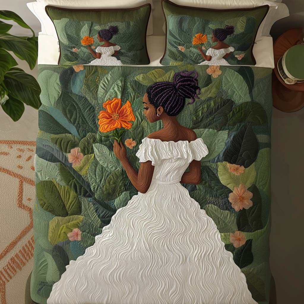 Petal Whisper quilted 3-piece bedding set on a made bed with two matching pillow shams