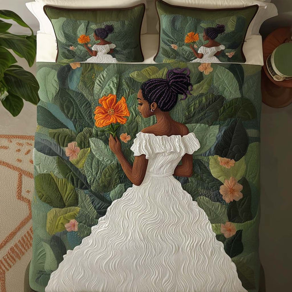Petal Whisper quilted 3-piece bedding set on a made bed with two matching pillow shams