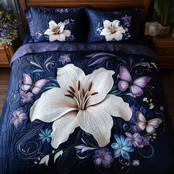Petal Wings quilted 3-piece bedding set on a made bed with two matching pillow shams