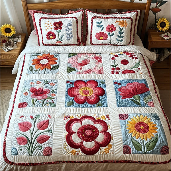 Petals and Patches quilted 3-piece bedding set on a made bed with two matching pillow shams