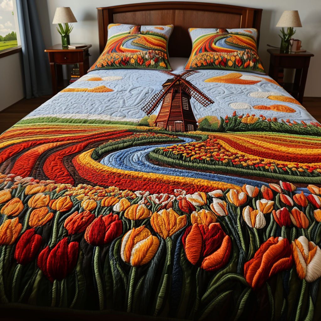 Petals and Wind quilted 3-piece bedding set on a made bed with two matching pillow shams