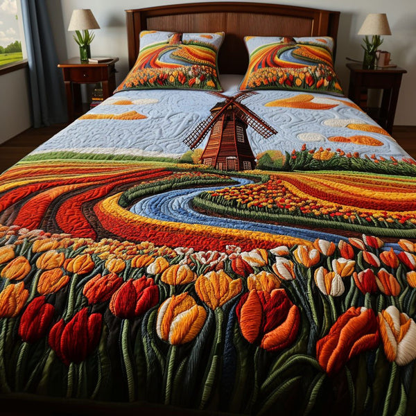 Petals and Wind quilted 3-piece bedding set on a made bed with two matching pillow shams