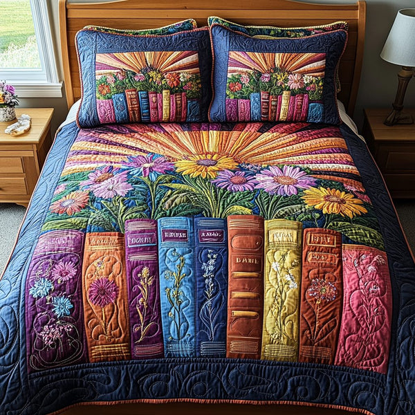 Petals Prose quilted 3-piece bedding set on a made bed with two matching pillow shams