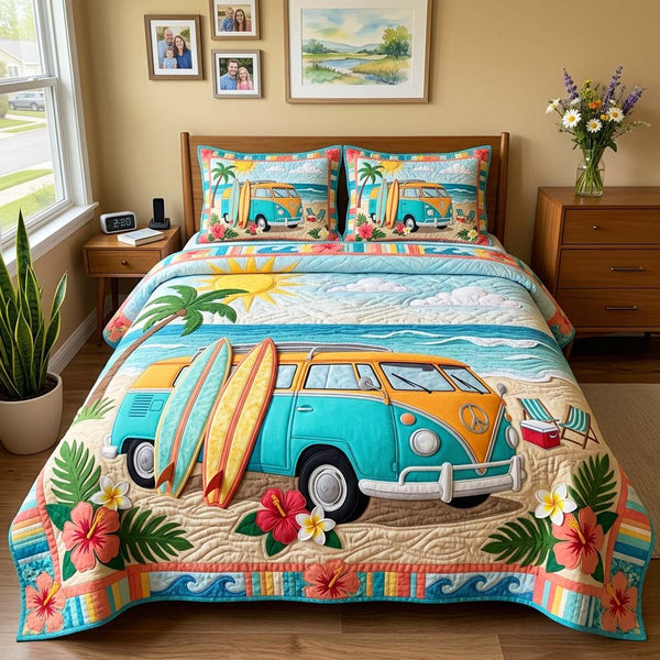 Picnic Beach quilted 3-piece bedding set on a made bed in a light coastal bedroom